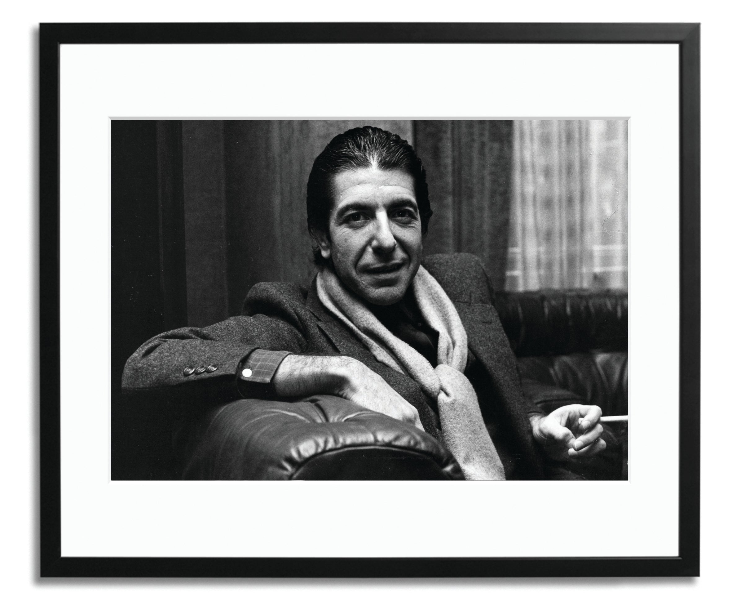 Leonard Cohen shares a joke and smokes a cigarette, Framed photograph