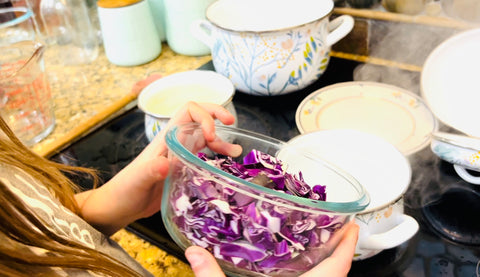 pouring cabbage in boiling water