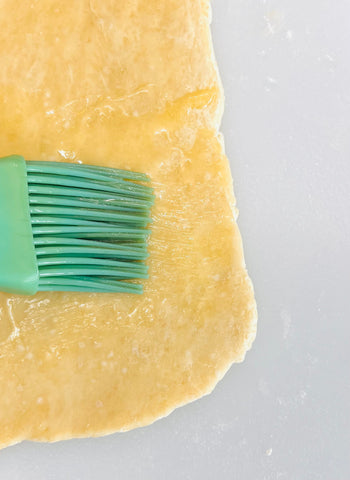 Brushing Dough With Butter