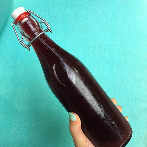 Elderberry syrup in a bottle