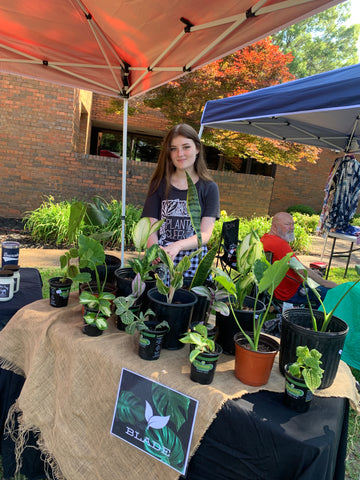 Girl selling house plants