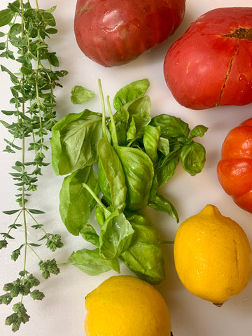 Group of fresh herbs and tomatoes 