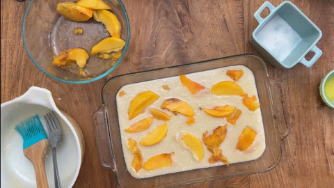 Adding peaches to cobbler