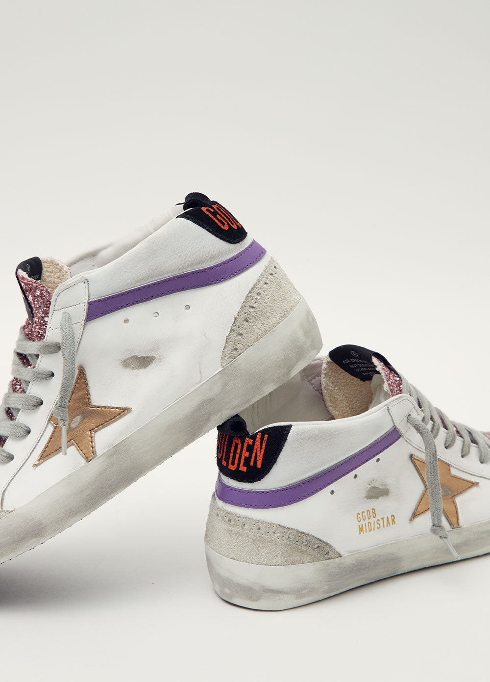 Women's White pink Mid Star Sneakers by Golden Goose | Incu