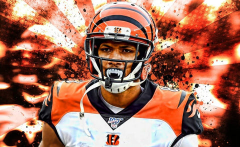 Tyler Boyds mouthguard Tyler Boyds gold mouthguard Bengals mouthguard Tyler Boyd Fang mouth guard