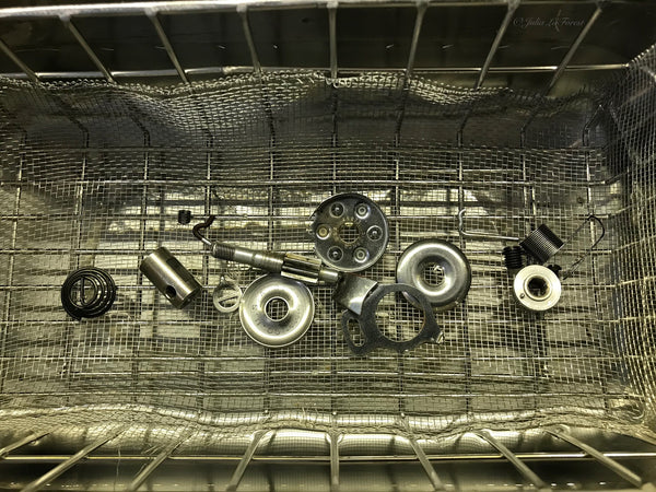 Loose Featherweight Parts being washed