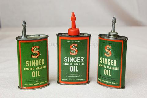 Red Green and White Vintage Singer Sewing Machine Oil Can