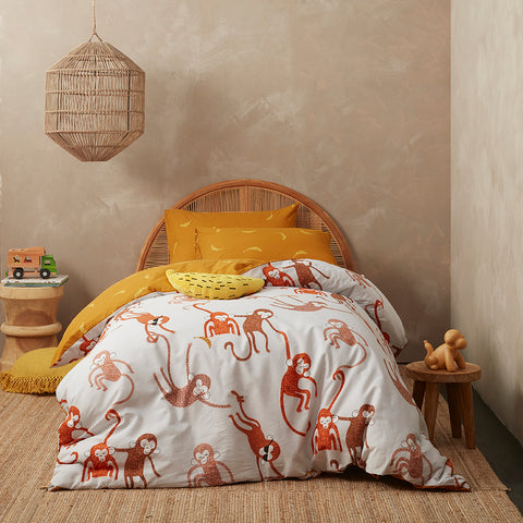 KAS Australia Monkey Kids Quilt Cover Set styled with plush pillows.