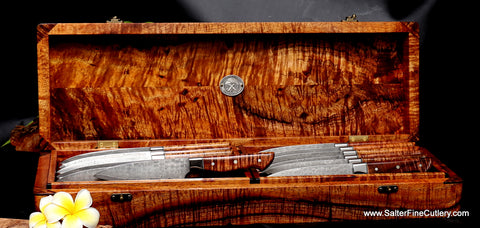 The many faces of curly Hawaiian koa wood demonstrated in this 12-piece steak knife set with presentation box handmade by Salter Fine Cutlery