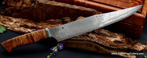 270mm hidden tang Charybdis design series clip-point carving knife with ergonomic handle with small stainless steel fitting between the wood and blade luxury carving knives by Salter Fine Cutlery