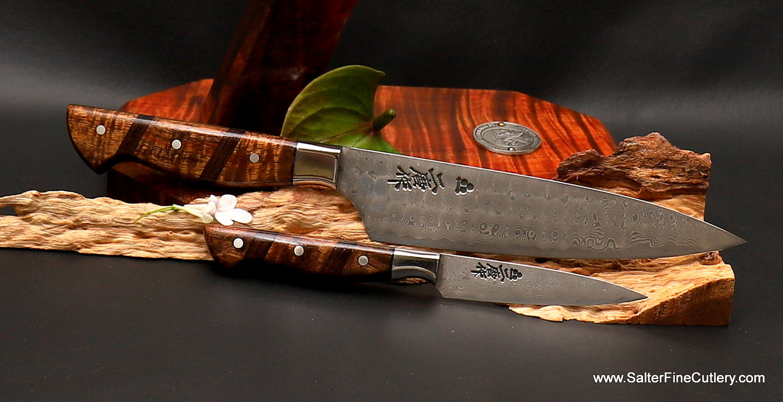 Custom order chef knives with top-of-the-line whirlpool damascus pattern and exotic koa wood handles by Salter Fine Cutlery