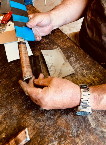 Inspecting the handle during final phases of handle creation for a new 2-piece chef knife set from Salter Fine Cutlery creators of handmade luxury cutlery