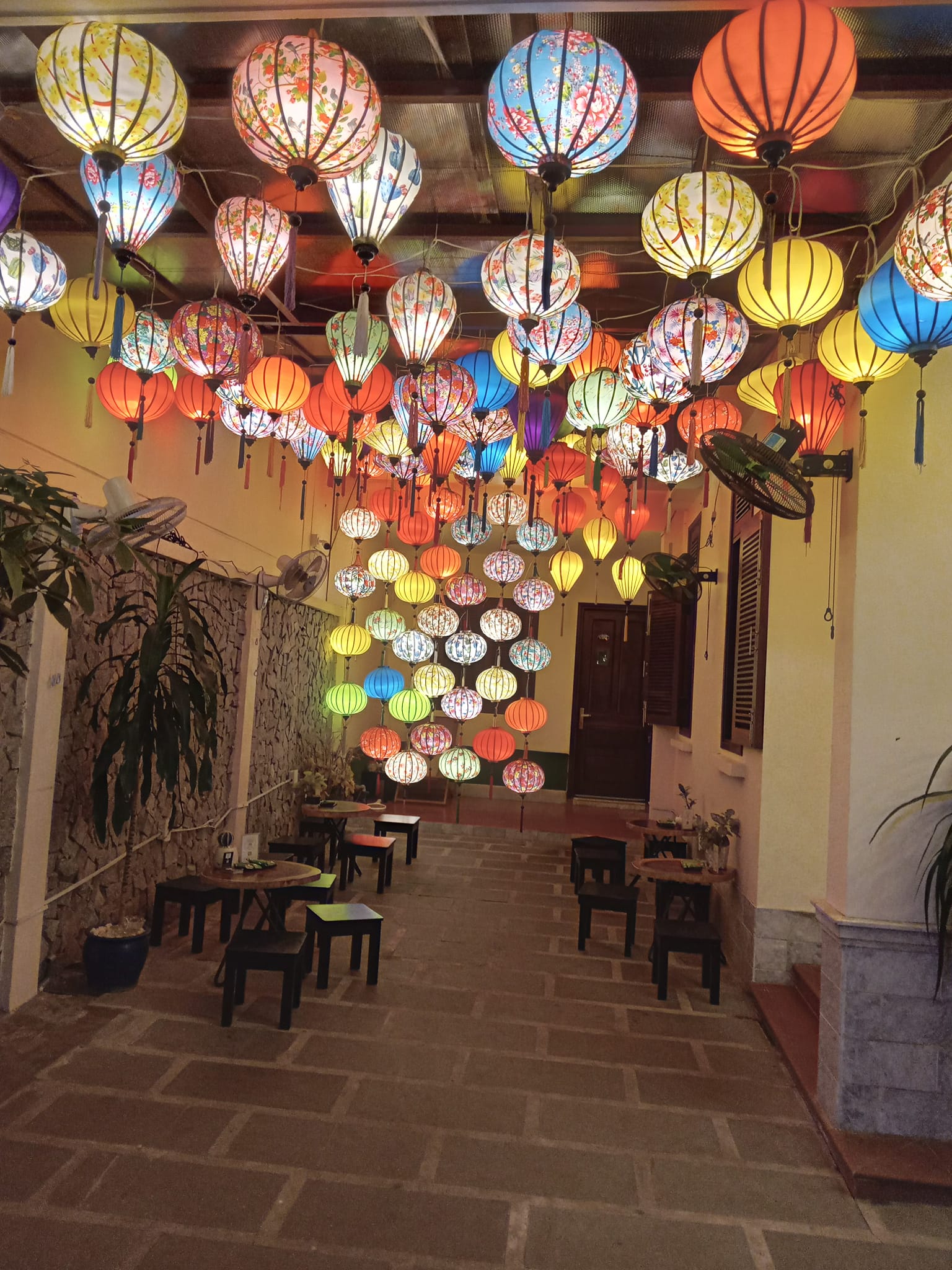 Lots of colourful lanterns hang from the ceiling in a massage parlour in Da Nang, Vietnam