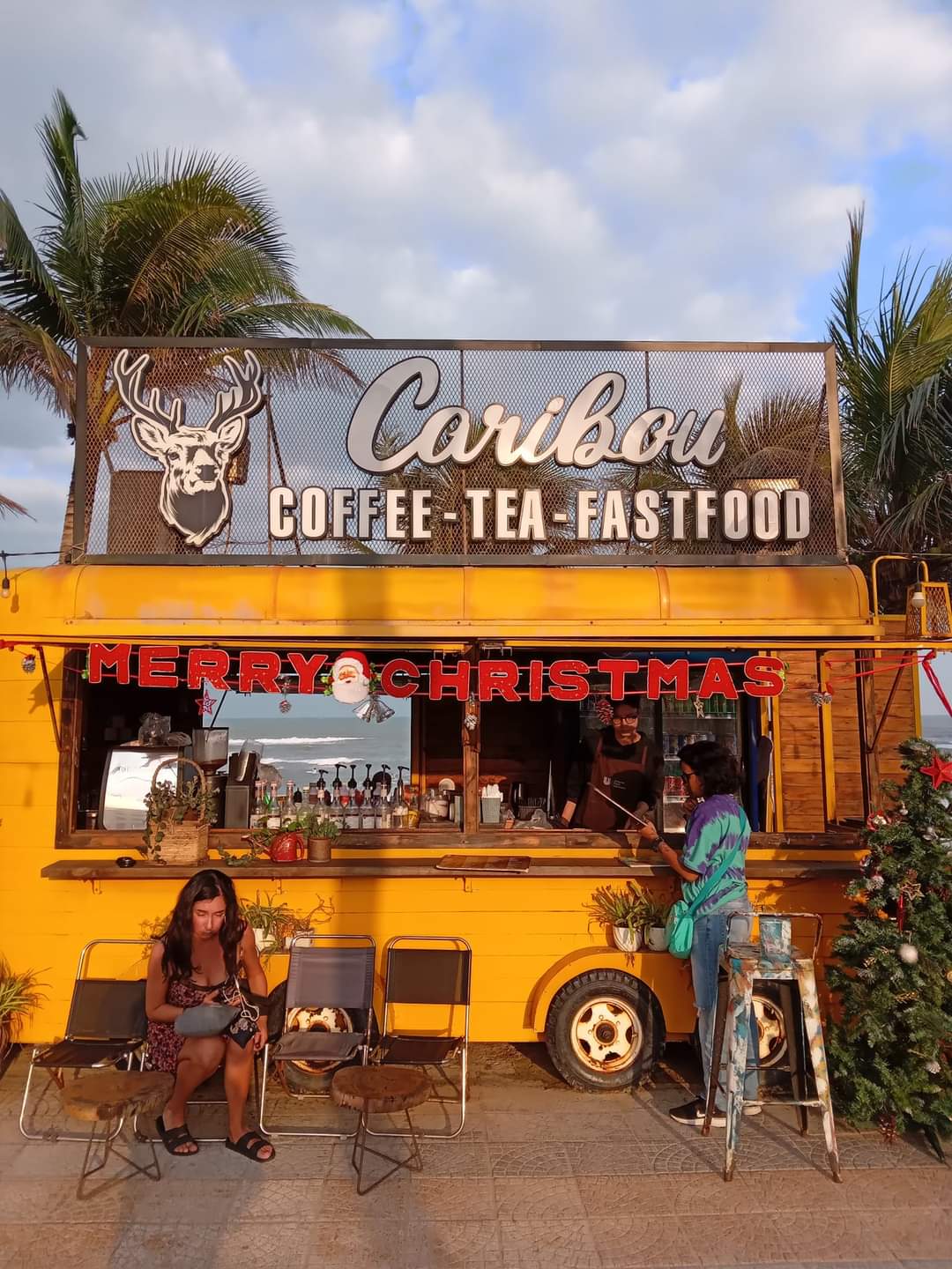 Yellow mobile coffee food truck in Da Nang, Vietnam