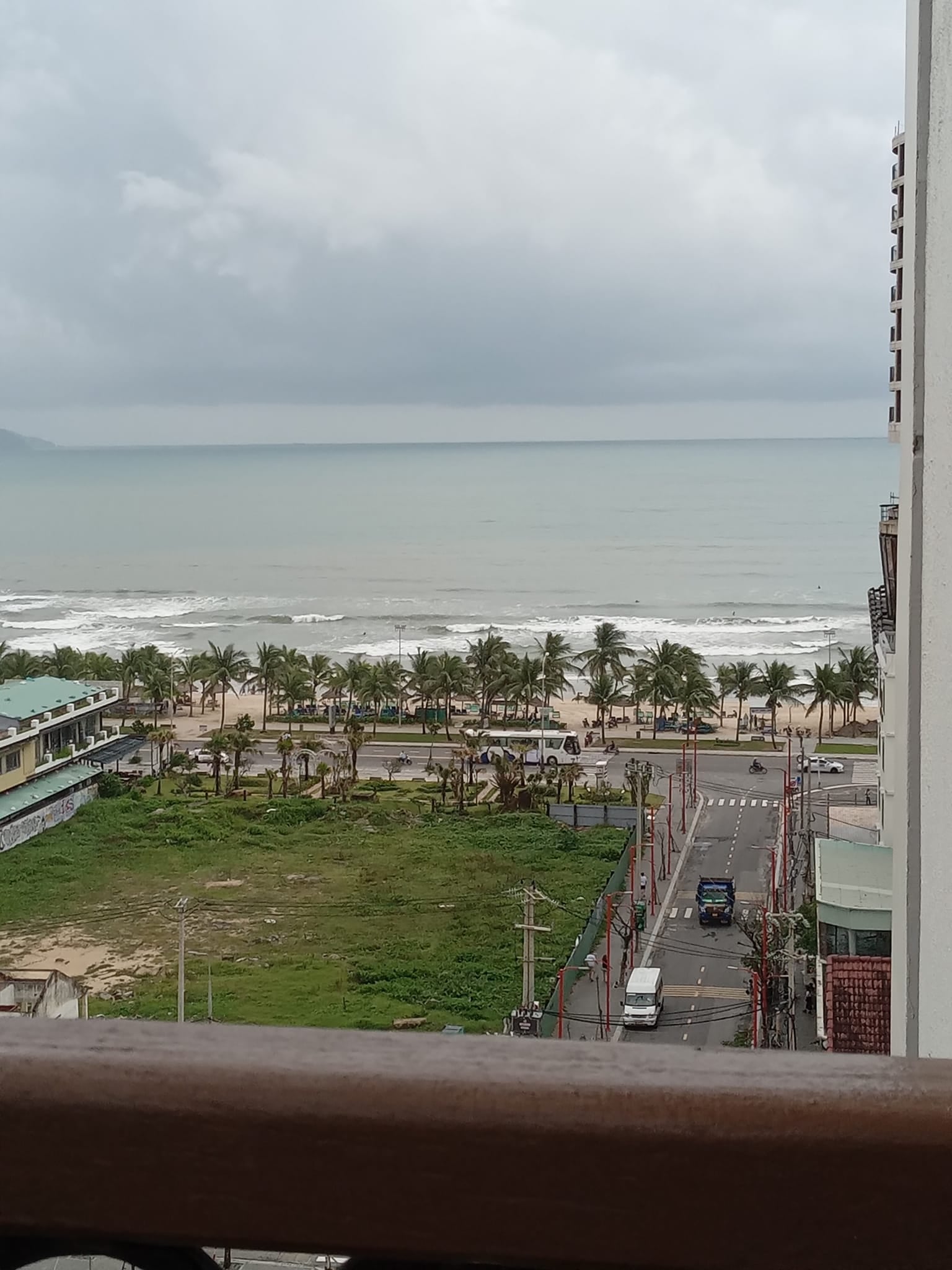 Muggy day in Da Nang, Vietnam. View from the balcony to the ocean. Suniela Beach travel blog.