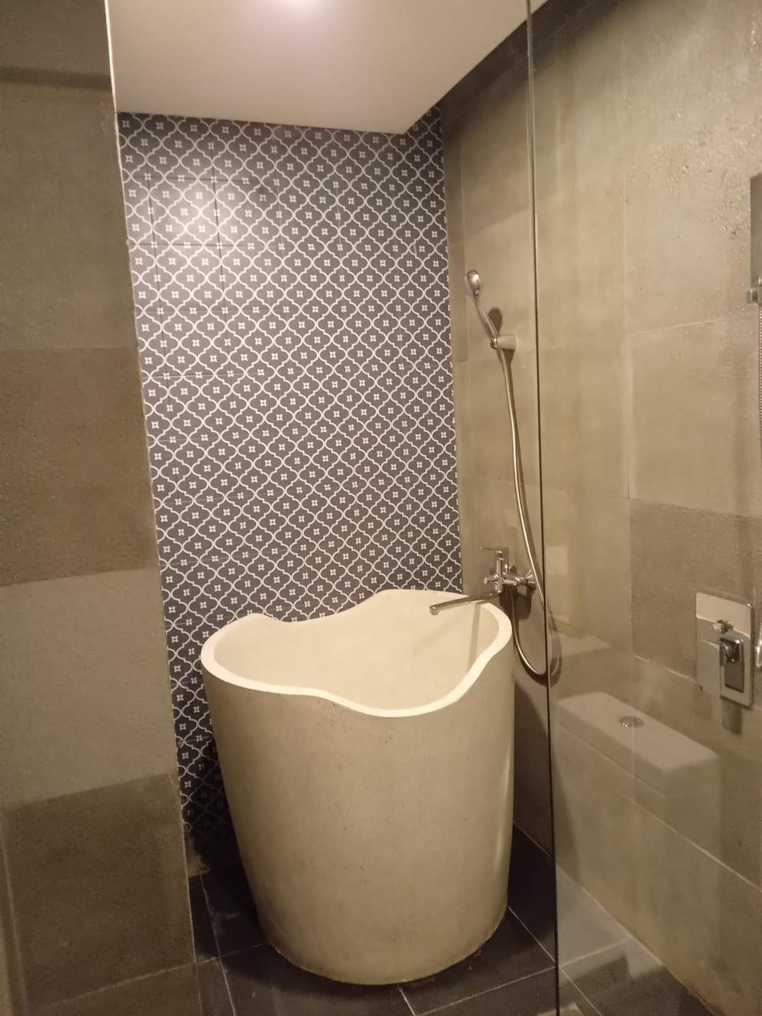 A small bathtub and shower in Da Nang, Vietnam