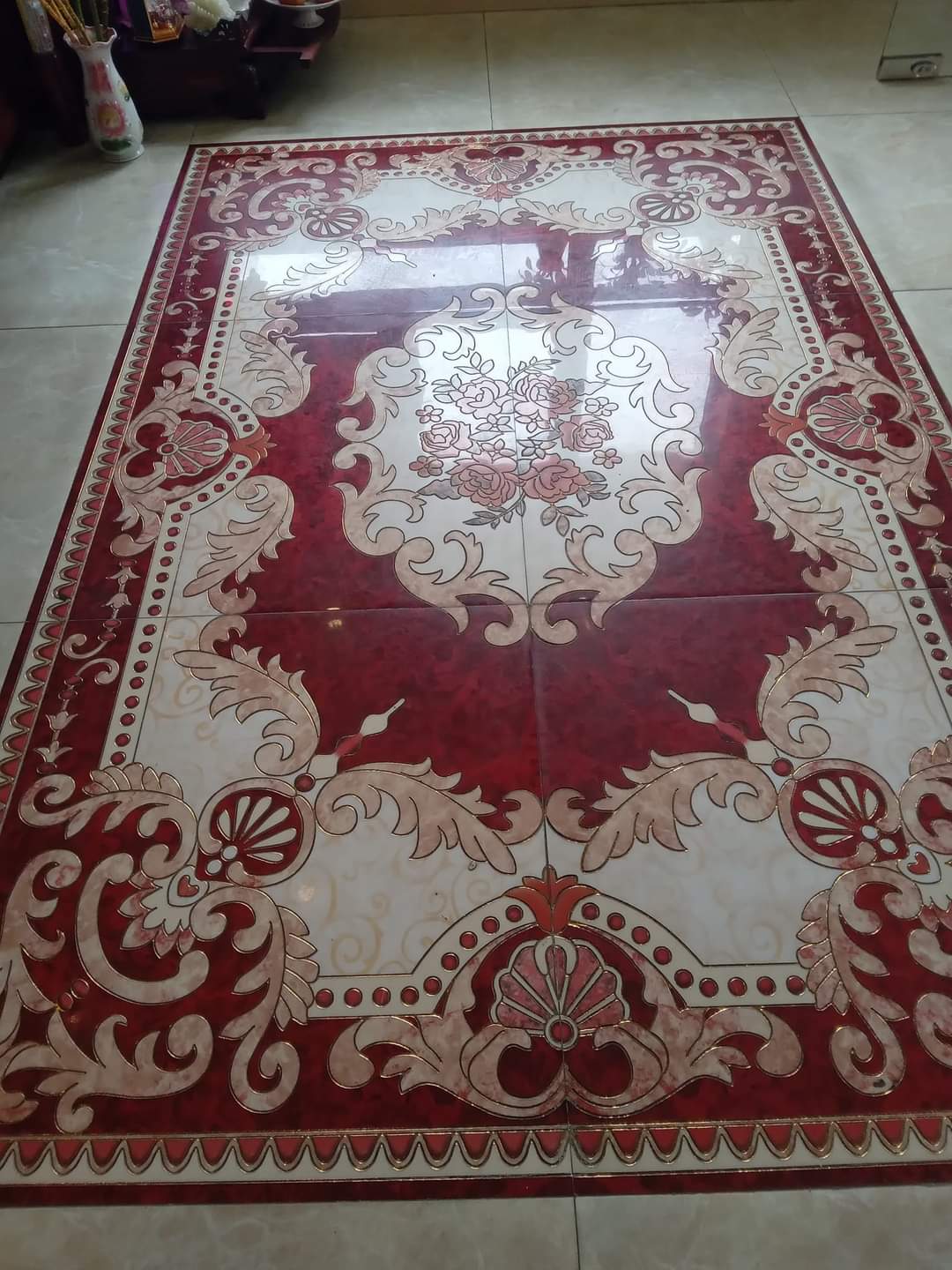 Fancy and ornate tiles in hotel lobby, with gold that glitters