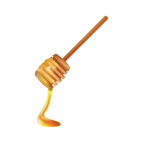 Honey dripping from the wooden honey spoon