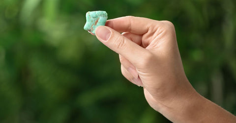 Hand Holding Chrysoprase Gemstone