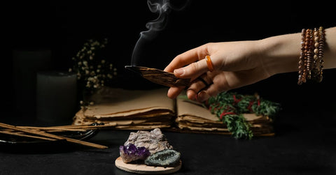 Hand with Palo Santo