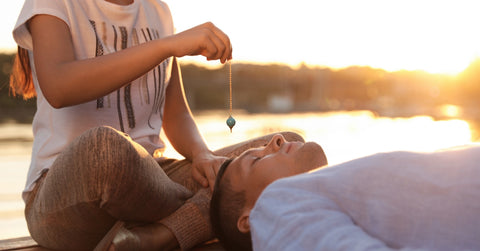 Man at crystal healing session