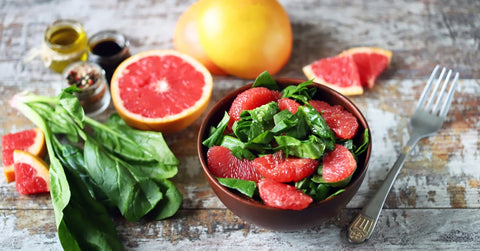 Spinach grapefruit salad in a bowl