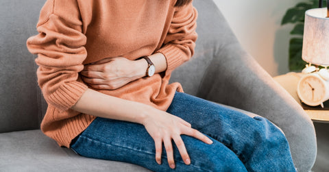 Woman Experiencing Stomach Pain