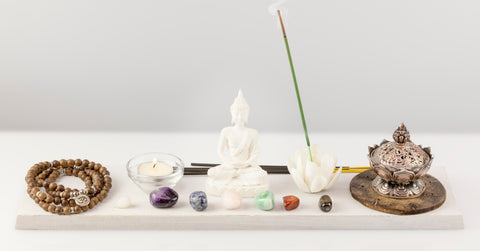 chakra stones and candle
