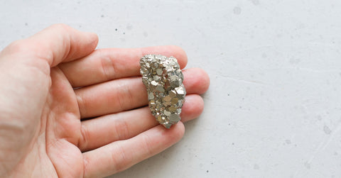 pyrite stone on hand