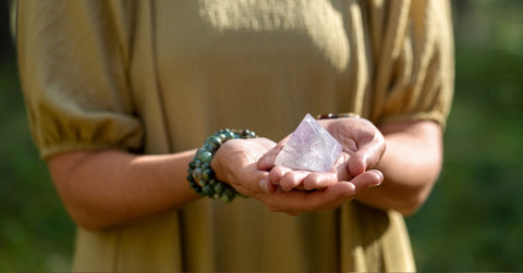 woman holding crystal