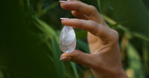 woman holding crystal quartz