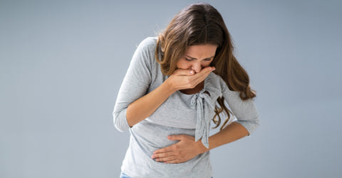 woman suffering from nausea