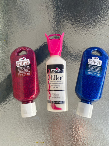 Fabric paint in Red, White, and Blue.  Also can find in glitter shades.