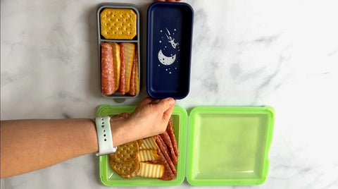 Using the Soft Shell and the Suction-Go-Bowl to pack on-the-go charcuterie for parents and kids!