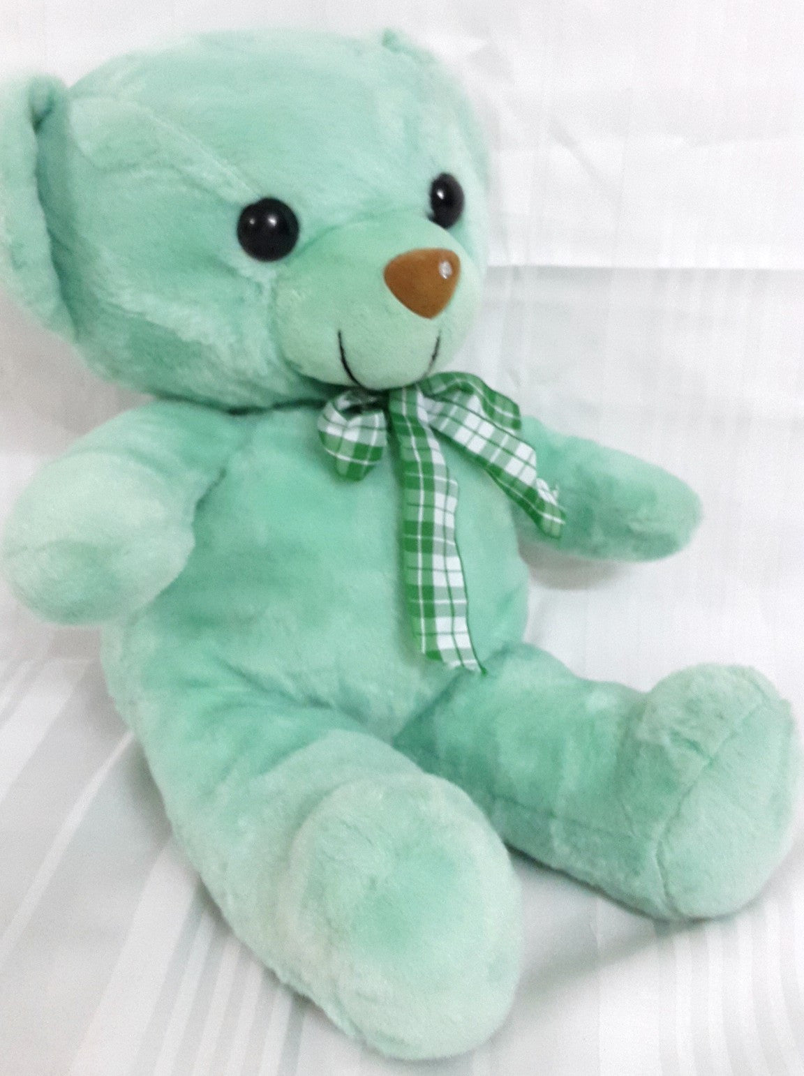 green colour teddy bear
