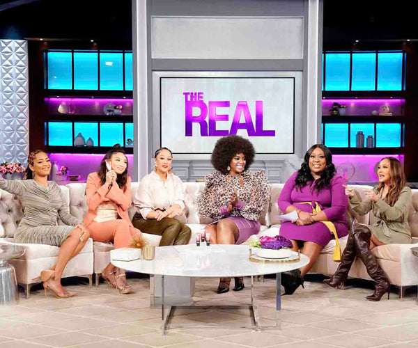 The cast of the daytime television talk show The Real
