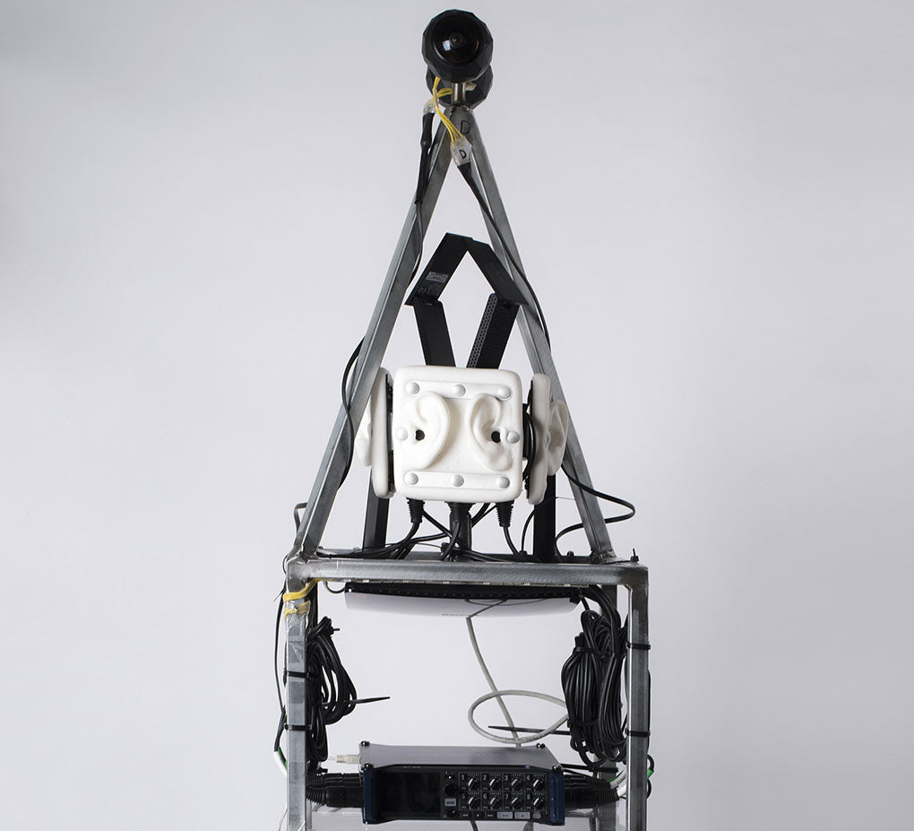 Image of a custom VR backpack featuring 360Fly cameras, a 3Dio Omni binaural microphone and a Zoom F8 digital recorder.
