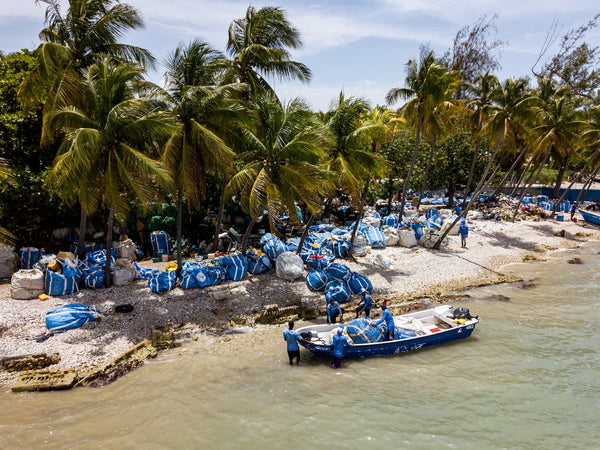 4ocean Haiti Crew Unloading Supersacks at Headquarters