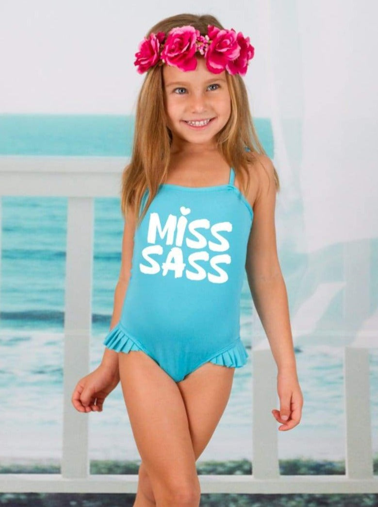 https://cdn.shopify.com/s/files/1/0996/1812/products/girls-turquoise-flutter-sleeve-miss-sass-side-ruffle-one-piece-swimsuit-20-39-99-40-59-10y12y-2t3t-4t5y-mia-belle-baby_224.jpg