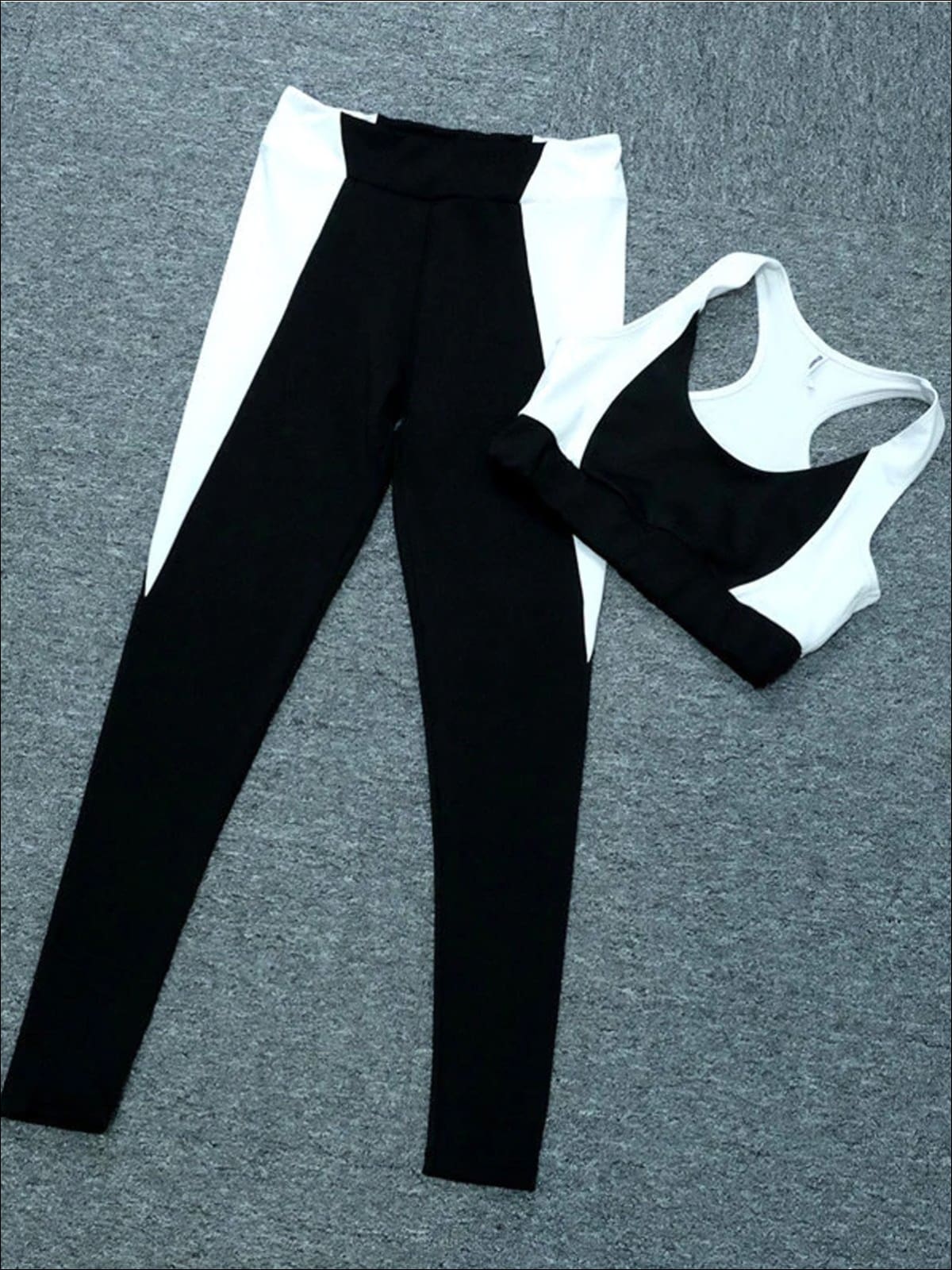 https://cdn.shopify.com/s/files/1/0996/1812/products/womens-black-white-sports-bra-leggings-set-20-39-99-40-59-bfcutoff-dropified-activewear-mia-belle-overseas-fulfillment-baby_440.jpg