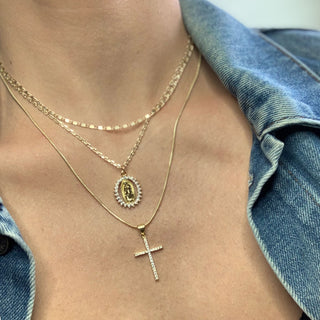 coin and cross layered necklace