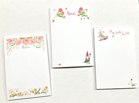 spring themes note pads and to do lists, featuring gnomes, strawberries and flowers