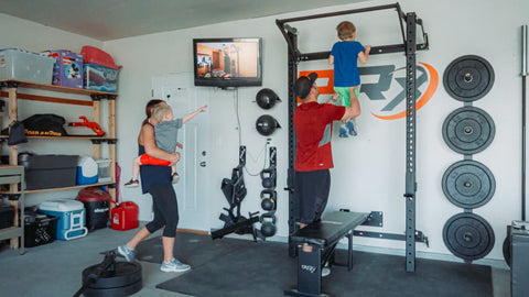 Corey and the Family in their home gym