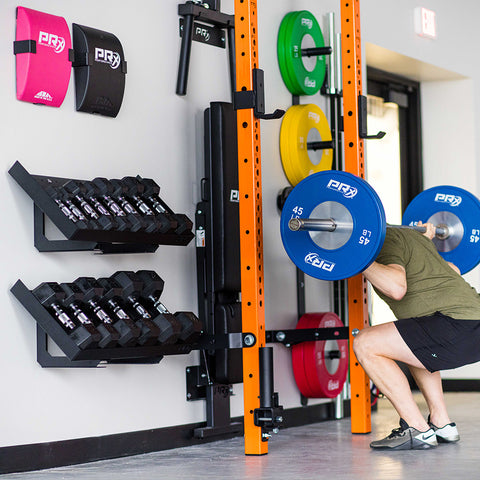 Man squatting near new storage item