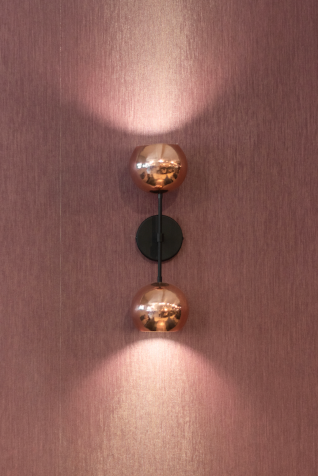 dual globe wall sconce in copper 