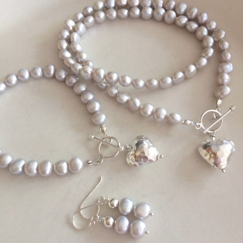 grey pearl earrings and bracelet