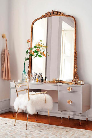 Gray vanity with copper embellishments