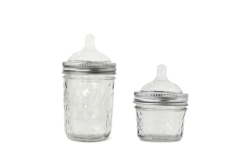 small glass baby bottles
