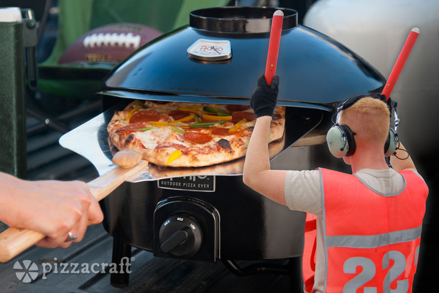 Guiding your pizza into your pizza oven