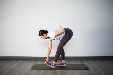 standing bent over calf stretch